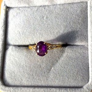 14 k gold and amethyst ring.